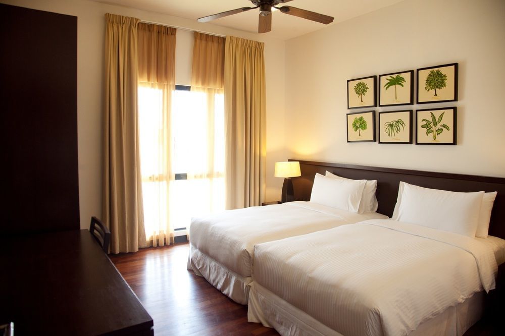 Avani Sepang Goldcoast Resort Kampong Bagan Lalang Dış mekan fotoğraf A bedroom at the hotel